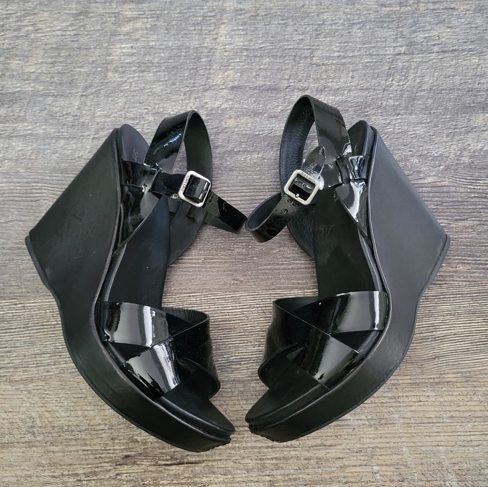 Kork-ease wedge patent leather sandals.